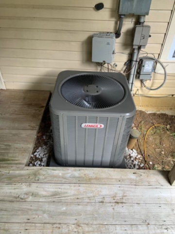 Lennox 17 plus SEER electric air-conditioning condenser installation